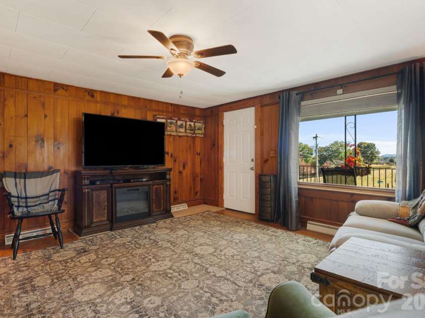 39 Brown Cove Road, Clyde, NC 28721.  MLS# CAR4433477, YatesRealty ID 57984. Living room
