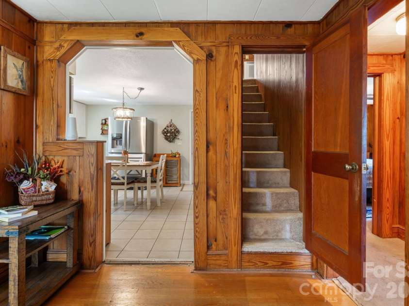 39 Brown Cove Road, Clyde, NC 28721.  MLS# CAR4433477, YatesRealty ID 57984. Stairs to 2nd floor