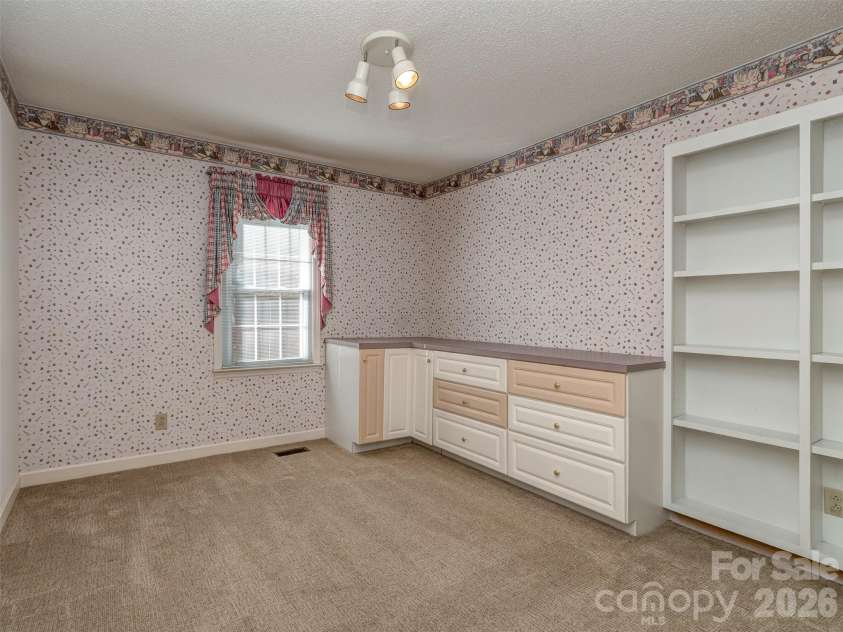 7301 Lee Rea Road, Charlotte, NC 28226.  MLS# CAR4428140, YatesRealty ID 57988. Bedroom 4 with Built-in's