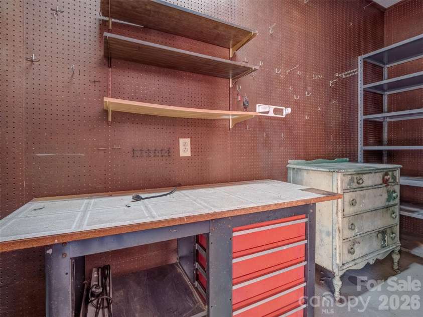 7301 Lee Rea Road, Charlotte, NC 28226.  MLS# CAR4428140, YatesRealty ID 57988. Workshop in Garage