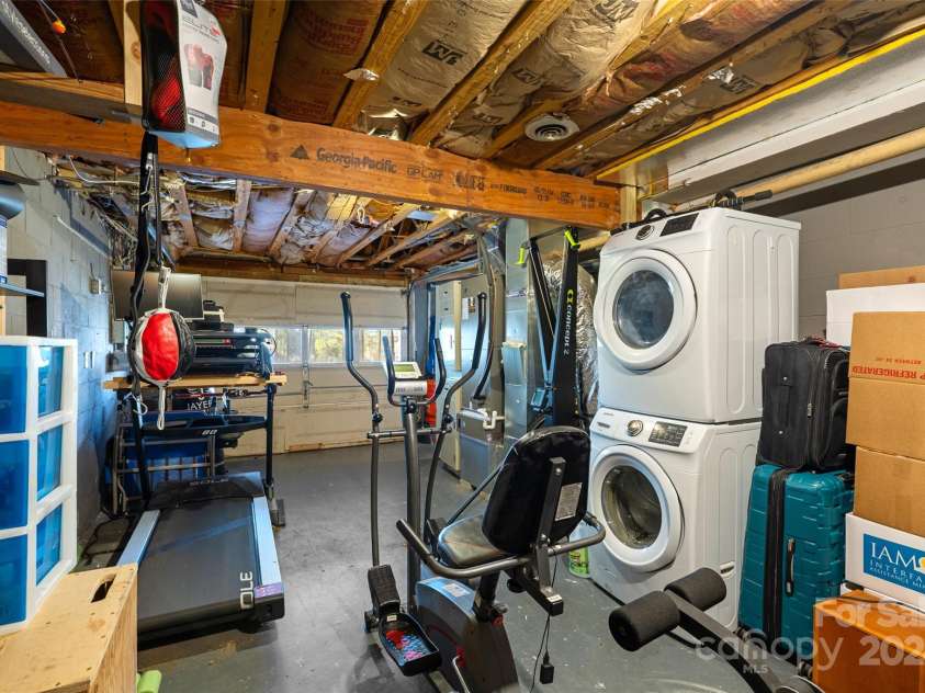 66 Beechwood Drive, Horse Shoe, NC 28742.  MLS# CAR4201481, YatesRealty ID 5799. Lower Level Garage and laundry