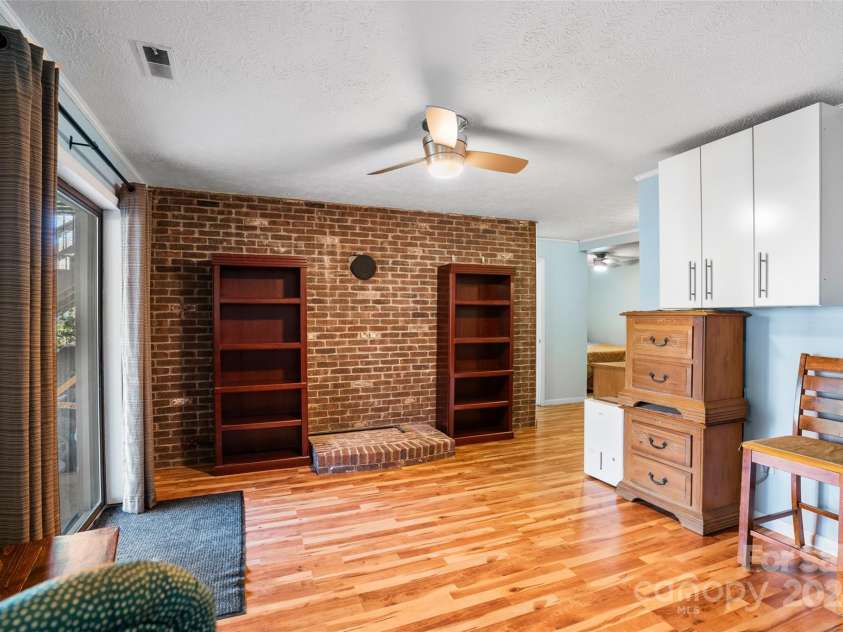 66 Beechwood Drive, Horse Shoe, NC 28742.  MLS# CAR4201481, YatesRealty ID 5799. Lower Level Living Area