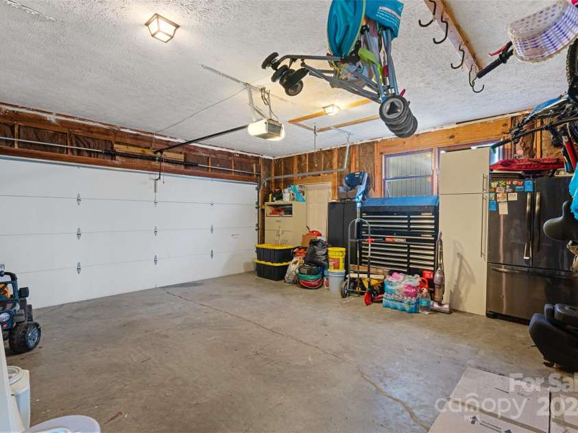 66 Beechwood Drive, Horse Shoe, NC 28742.  MLS# CAR4201481, YatesRealty ID 5799. Main Level 2 car garage