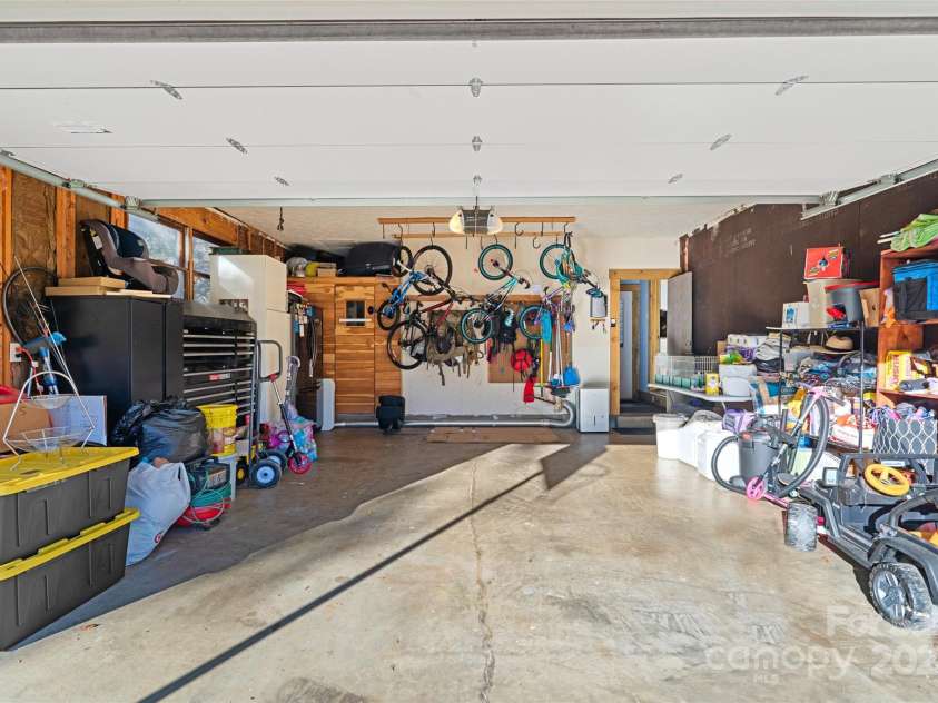 66 Beechwood Drive, Horse Shoe, NC 28742.  MLS# CAR4201481, YatesRealty ID 5799. Main Level 2 car garage and sauna