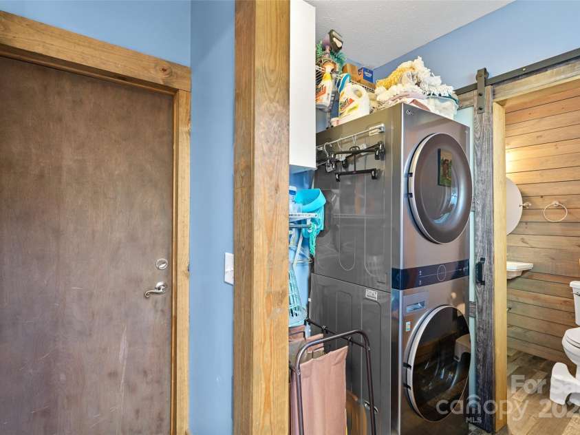 66 Beechwood Drive, Horse Shoe, NC 28742.  MLS# CAR4201481, YatesRealty ID 5799. Main Level Laundry area