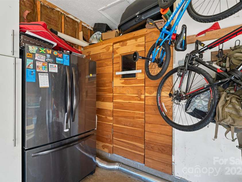 66 Beechwood Drive, Horse Shoe, NC 28742.  MLS# CAR4201481, YatesRealty ID 5799. Main Level Sauna in Garage