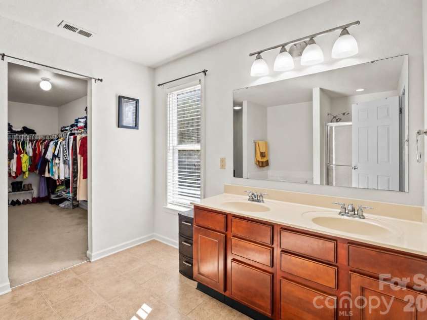 12607 Frank Wiley Lane, Charlotte, NC 28278.  MLS# CAR4433234, YatesRealty ID 57993. Master bath with walk-in closet