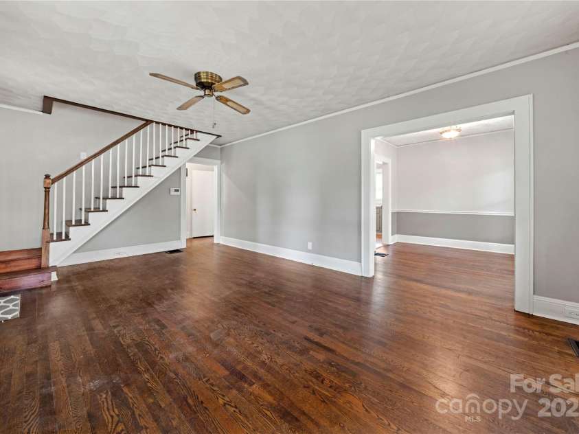 725 Graham Street, Shelby, NC 28150.  MLS# CAR4263455, YatesRealty ID 58. Living Room Into Dining Room