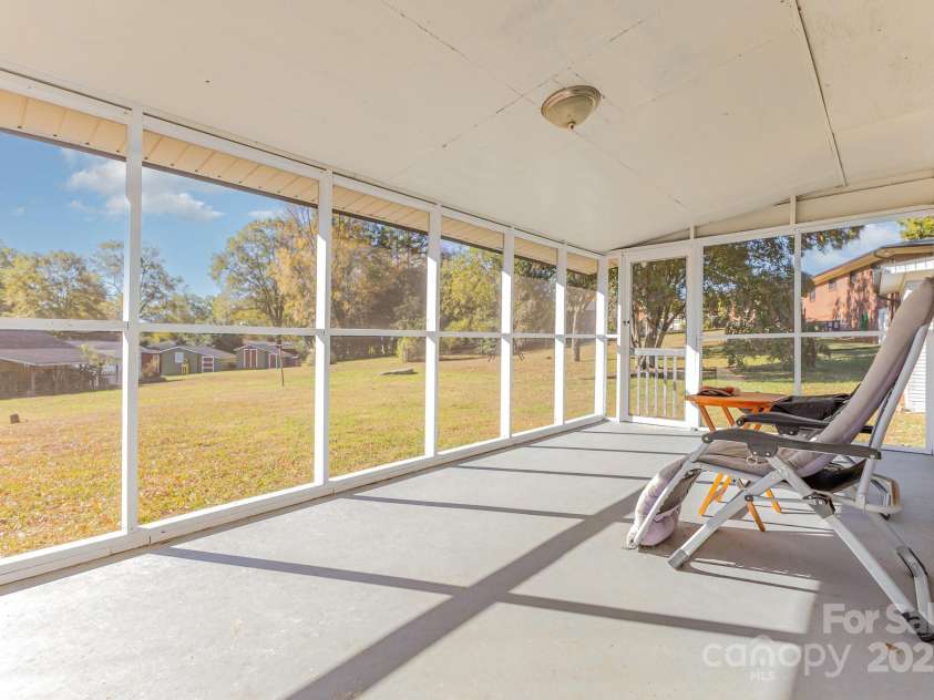 41 Fleetwood Drive, Concord, NC 28027.  MLS# CAR4318616, YatesRealty ID 580. Screened Rear Porch
