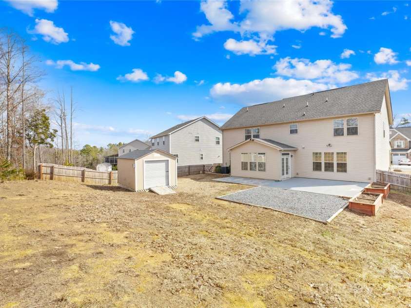 7405 Bosson Street, Concord, NC 28025.  MLS# CAR4218794, YatesRealty ID 5800. Backyard