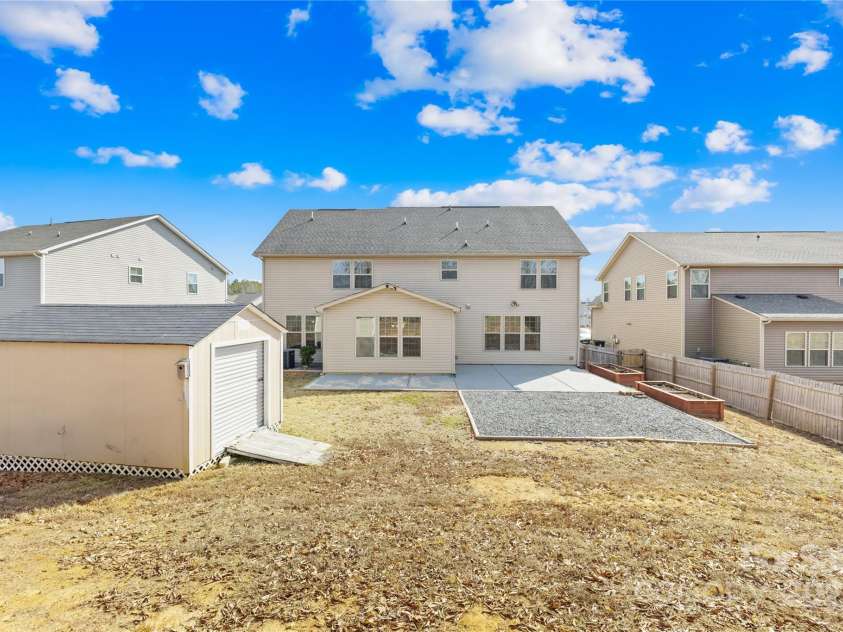 7405 Bosson Street, Concord, NC 28025.  MLS# CAR4218794, YatesRealty ID 5800. Backyard