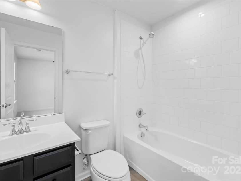 7405 Bosson Street, Concord, NC 28025.  MLS# CAR4218794, YatesRealty ID 5800. Bathroom upstairs