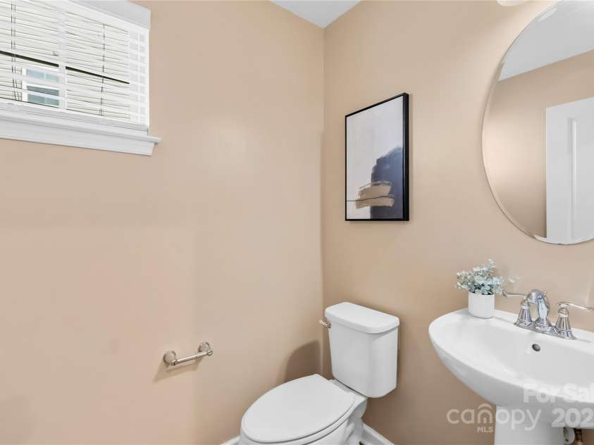 7405 Bosson Street, Concord, NC 28025.  MLS# CAR4218794, YatesRealty ID 5800. Downstair half bath