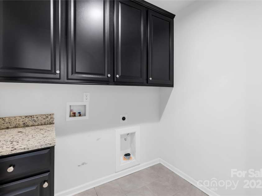 7405 Bosson Street, Concord, NC 28025.  MLS# CAR4218794, YatesRealty ID 5800. Laundry room