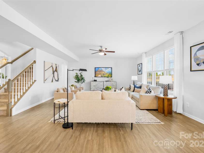 7405 Bosson Street, Concord, NC 28025.  MLS# CAR4218794, YatesRealty ID 5800. Living room view from kit