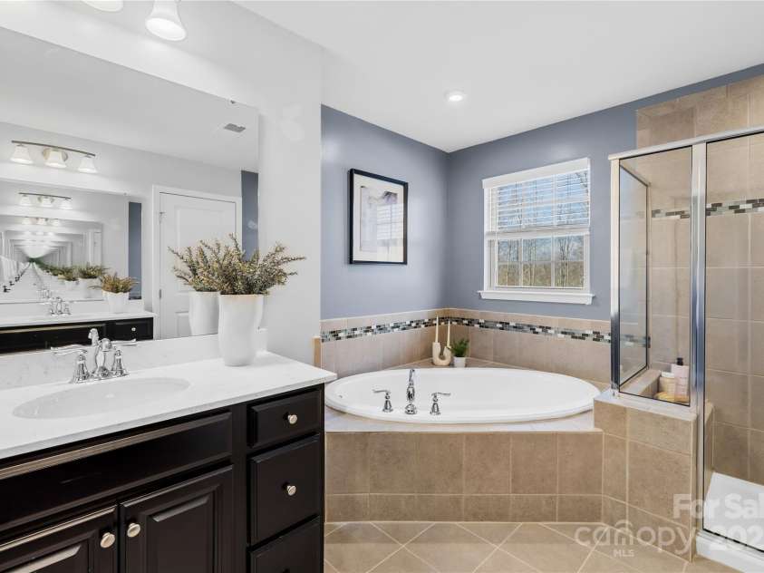 7405 Bosson Street, Concord, NC 28025.  MLS# CAR4218794, YatesRealty ID 5800. Primary bathroom tub