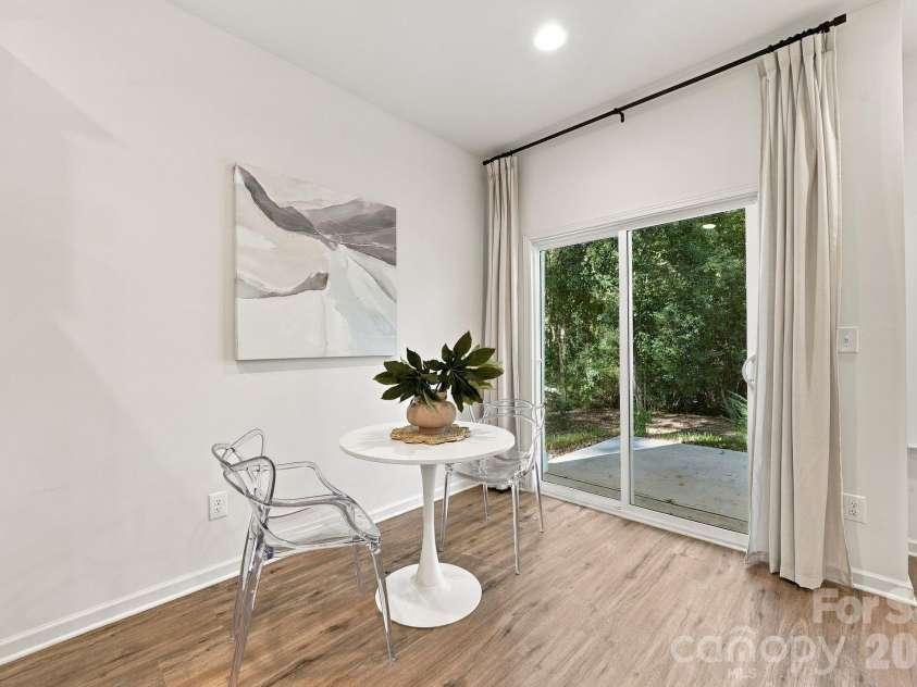 4715 Crestmont Drive, Charlotte, NC 28205.  MLS# CAR4436619, YatesRealty ID 58001. Dining area overlooks private backyard