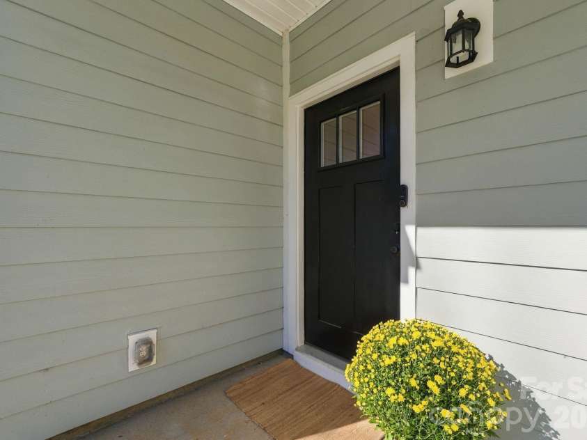 4715 Crestmont Drive, Charlotte, NC 28205.  MLS# CAR4436619, YatesRealty ID 58001. Front door