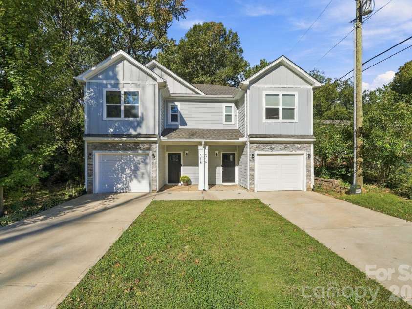4715 Crestmont Drive, Charlotte, NC 28205.  MLS# CAR4436619, YatesRealty ID 58001. Left side of duet for sale with private, tree-lined backyard