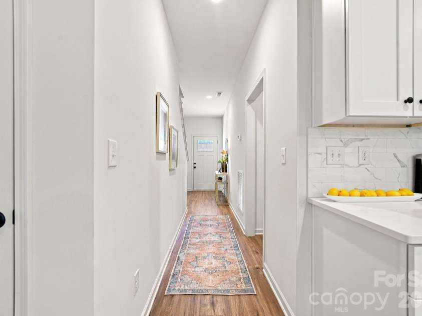 4715 Crestmont Drive, Charlotte, NC 28205.  MLS# CAR4436619, YatesRealty ID 58001. Main floor foyer and hallway