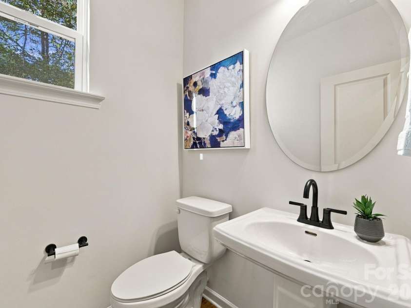 4715 Crestmont Drive, Charlotte, NC 28205.  MLS# CAR4436619, YatesRealty ID 58001. Main floor half bath