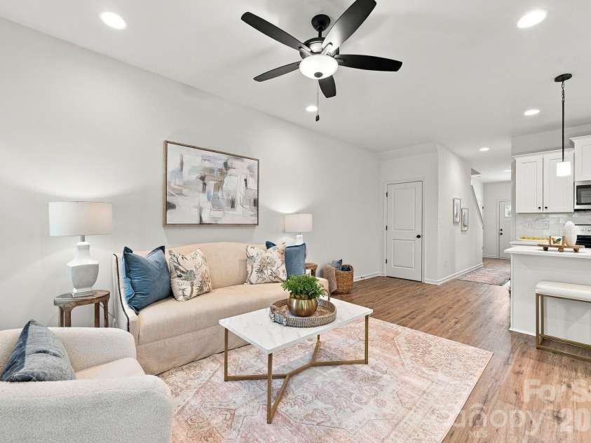 4715 Crestmont Drive, Charlotte, NC 28205.  MLS# CAR4436619, YatesRealty ID 58001. Open floor plan combines living area with kitchen for entertaining and flow