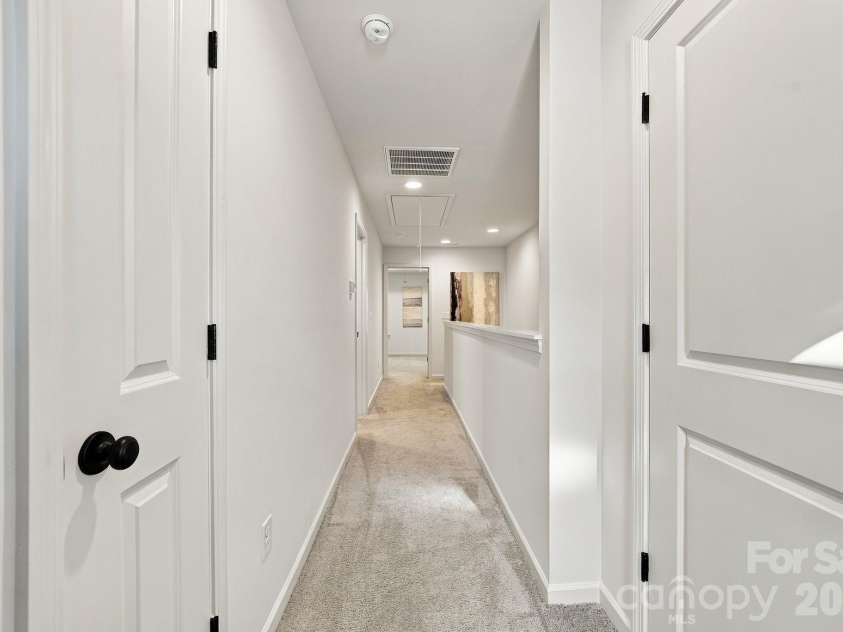 4715 Crestmont Drive, Charlotte, NC 28205.  MLS# CAR4436619, YatesRealty ID 58001. Upper hallway