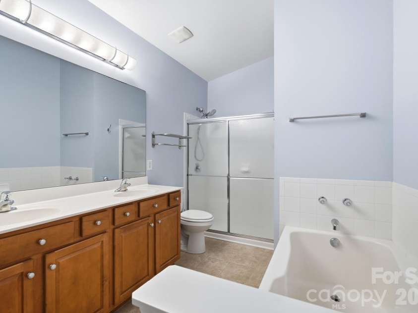 16752 Amberside Road, Cornelius, NC 28031.  MLS# CAR4435961, YatesRealty ID 58002. Primary Bathroom