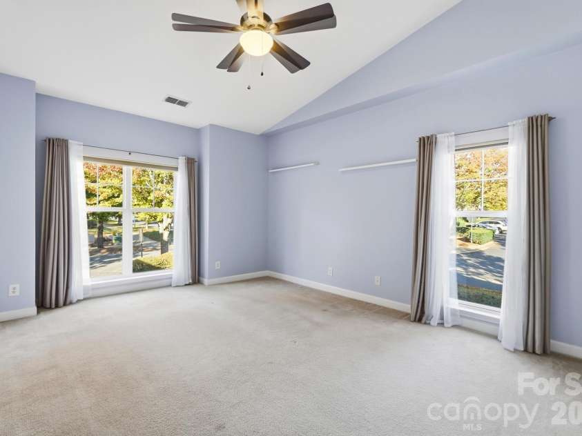 16752 Amberside Road, Cornelius, NC 28031.  MLS# CAR4435961, YatesRealty ID 58002. Primary Bedroom w/ Vaulted Ceiling