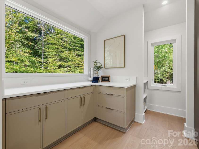 5401 Lancelot Drive, Charlotte, NC 28270.  MLS# CAR4432070, YatesRealty ID 58021. Storage nook in kitchen