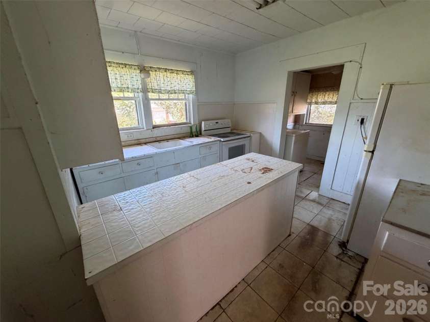 706 Carbon City Road, Morganton, NC 28655.  MLS# CAR4425473, YatesRealty ID 58048. 