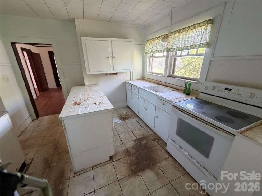 706 Carbon City Road, Morganton, NC 28655.  MLS# CAR4425473, YatesRealty ID 58048. 