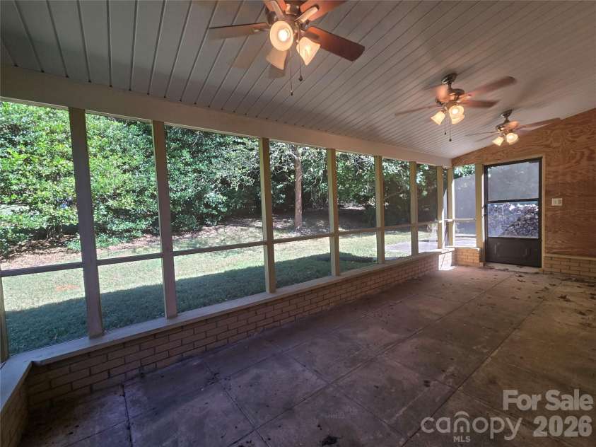 4449 Whispering Oaks Drive, Charlotte, NC 28213.  MLS# CAR4436983, YatesRealty ID 58056. Screened Patio
