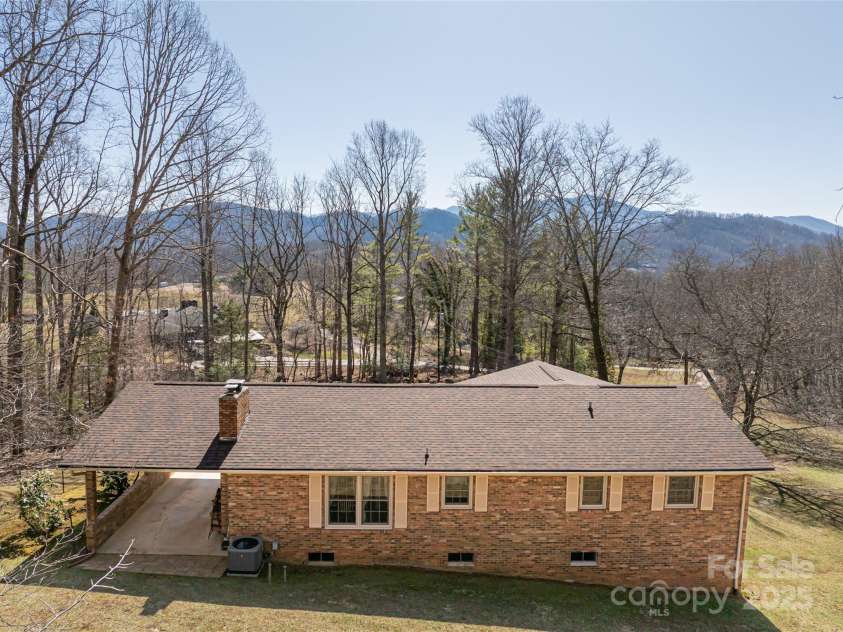 166 Huskins Road, Spruce Pine, NC 28777.  MLS# CAR4238257, YatesRealty ID 5807. Home with Mountain Views