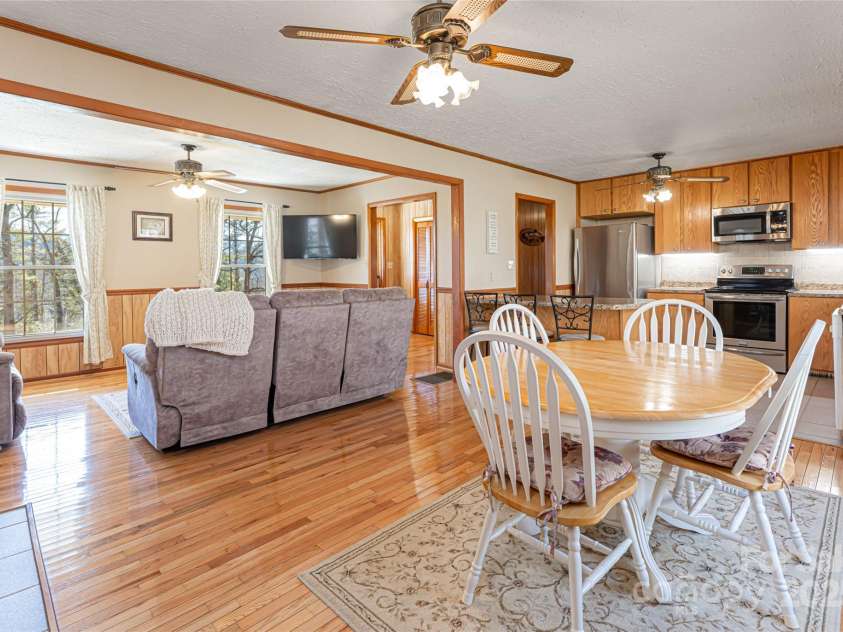 166 Huskins Road, Spruce Pine, NC 28777.  MLS# CAR4238257, YatesRealty ID 5807. Open floor plan with hardwood floors and updated kitchen