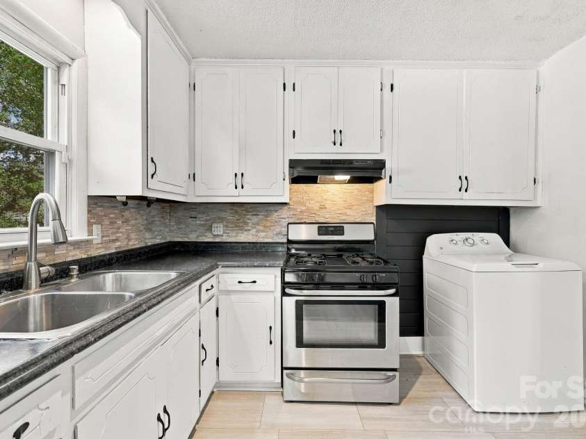 1202 Ridgewood Drive, Concord, NC 28027.  MLS# CAR4436535, YatesRealty ID 58084. 