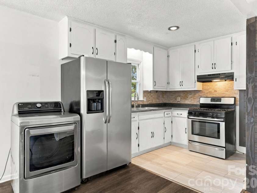 1202 Ridgewood Drive, Concord, NC 28027.  MLS# CAR4436535, YatesRealty ID 58084. 