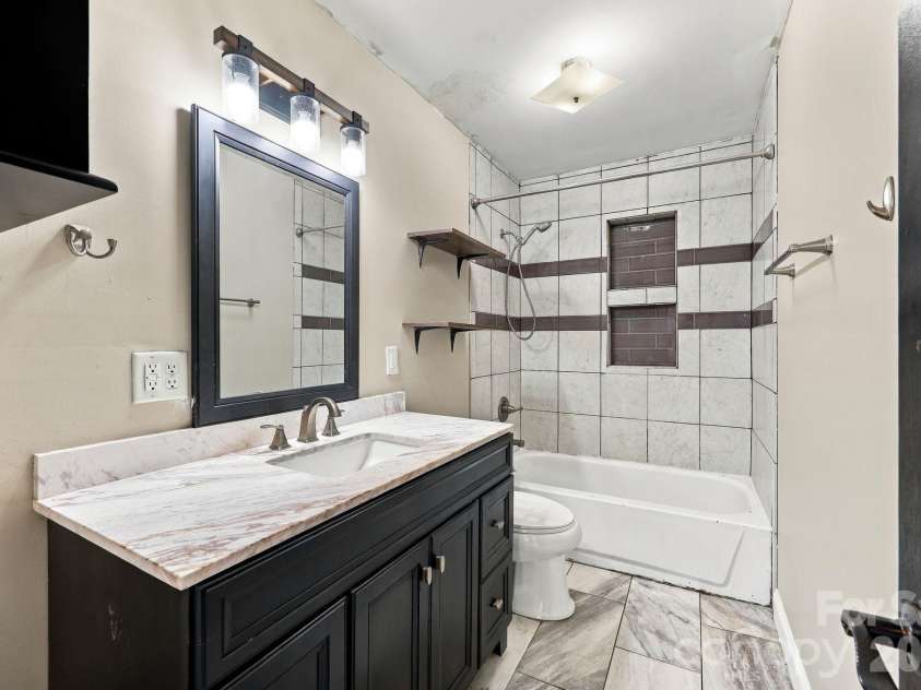 1202 Ridgewood Drive, Concord, NC 28027.  MLS# CAR4436535, YatesRealty ID 58084. 