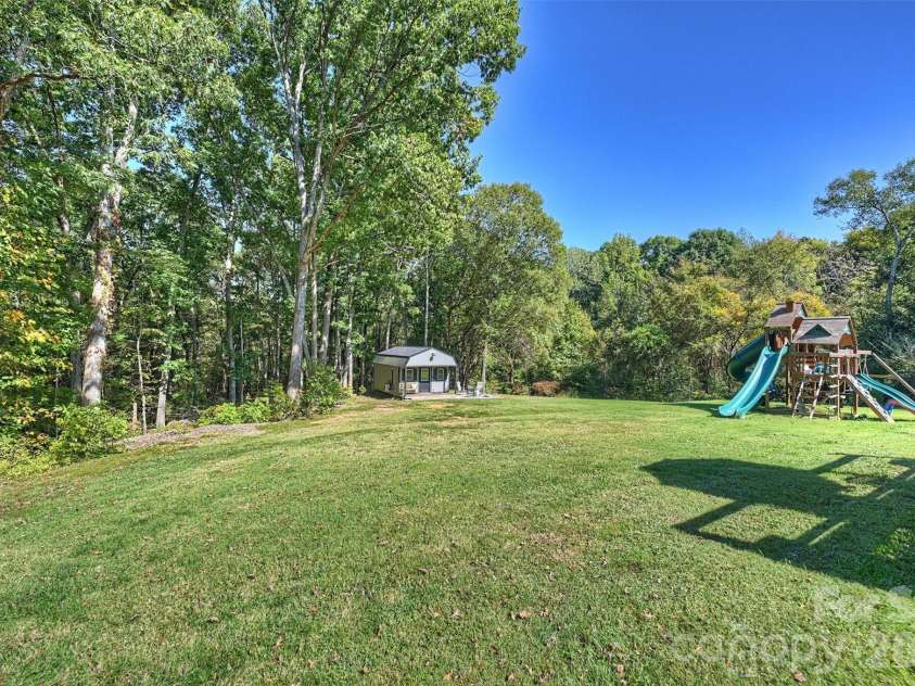 8708 Overcash Road, Concord, NC 28027.  MLS# CAR4433713, YatesRealty ID 58100. Back yard