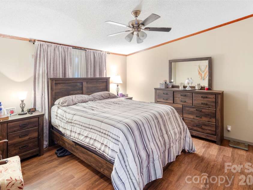 81 Dena Nix Lane, Hendersonville, NC 28792.  MLS# CAR4436857, YatesRealty ID 58109. Primary bedroom 1