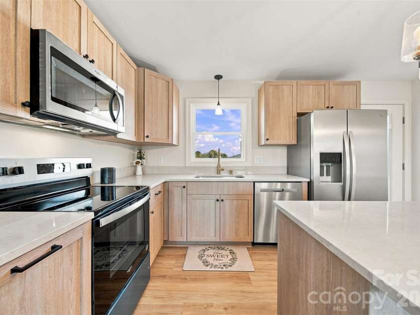 4176 Grace Chapel Road, Granite Falls, NC 28630.  MLS# CAR4436580, YatesRealty ID 58137. Easy close cabinets!
