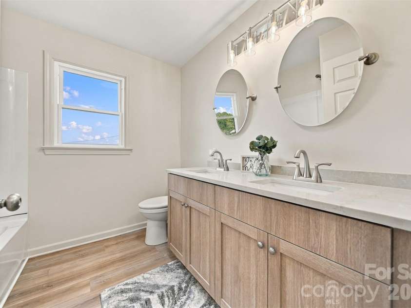 4176 Grace Chapel Road, Granite Falls, NC 28630.  MLS# CAR4436580, YatesRealty ID 58137. Hall bathroom with a double vanity!