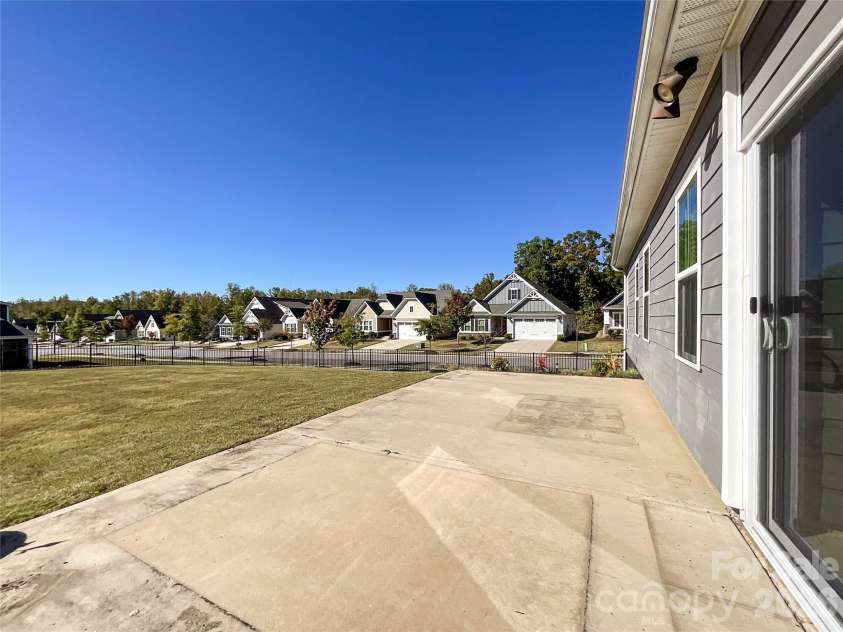 5091 Summer Surprise Lane, Charlotte, NC 28215.  MLS# CAR4437130, YatesRealty ID 58141. Rear Patio