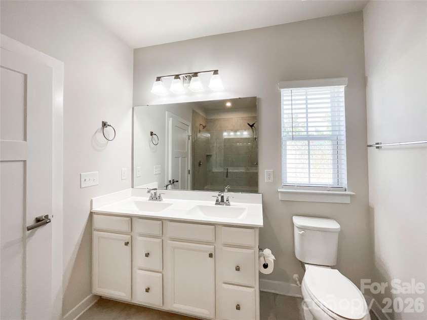 5091 Summer Surprise Lane, Charlotte, NC 28215.  MLS# CAR4437130, YatesRealty ID 58141. Secondary Bathroom Vanity