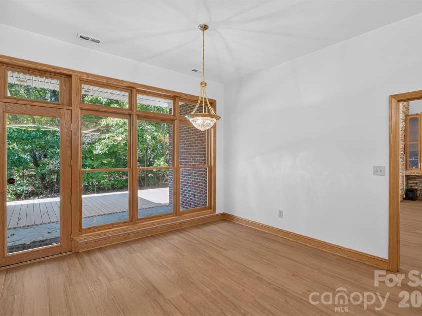 253 Highway 161 South, Clover, SC 29710.  MLS# CAR4435858, YatesRealty ID 58205. Breakfast area - unfurnished with deck view