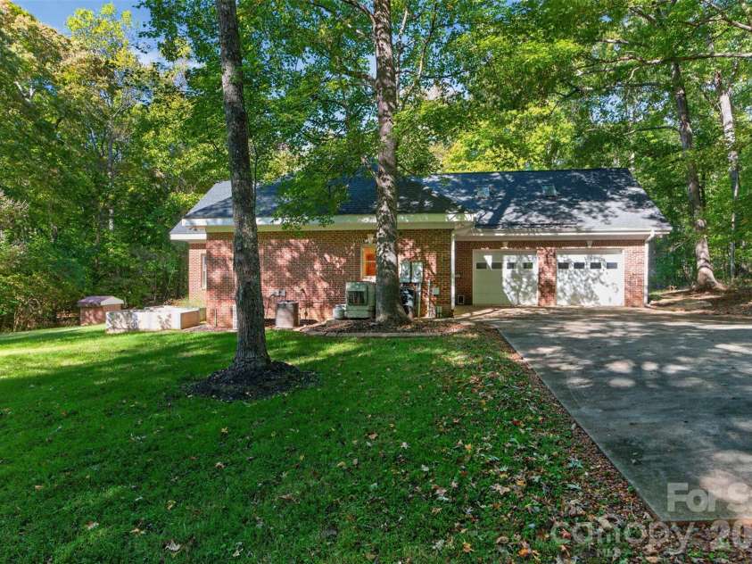 253 Highway 161 South, Clover, SC 29710.  MLS# CAR4435858, YatesRealty ID 58205. Oversized parking pad near side garage