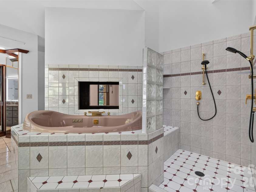 253 Highway 161 South, Clover, SC 29710.  MLS# CAR4435858, YatesRealty ID 58205. Primary Bathroom with jetted tub and fireplace