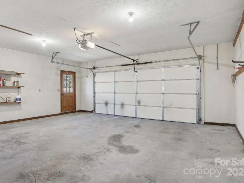 127 Kalmia Terrace Court, Hendersonville, NC 28739.  MLS# CAR4227852, YatesRealty ID 5821. Main level garage