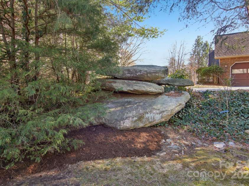 127 Kalmia Terrace Court, Hendersonville, NC 28739.  MLS# CAR4227852, YatesRealty ID 5821. Rock our cropping in yard