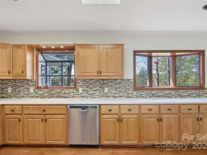 127 Kalmia Terrace Court, Hendersonville, NC 28739.  MLS# CAR4227852, YatesRealty ID 5821. Two bay windows